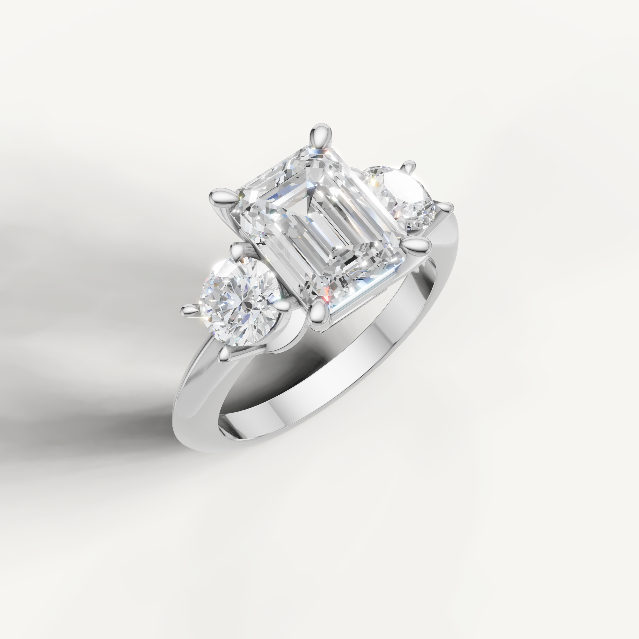 IGI certified emerald lab diamond ring with round side stones white gold DEF VVS