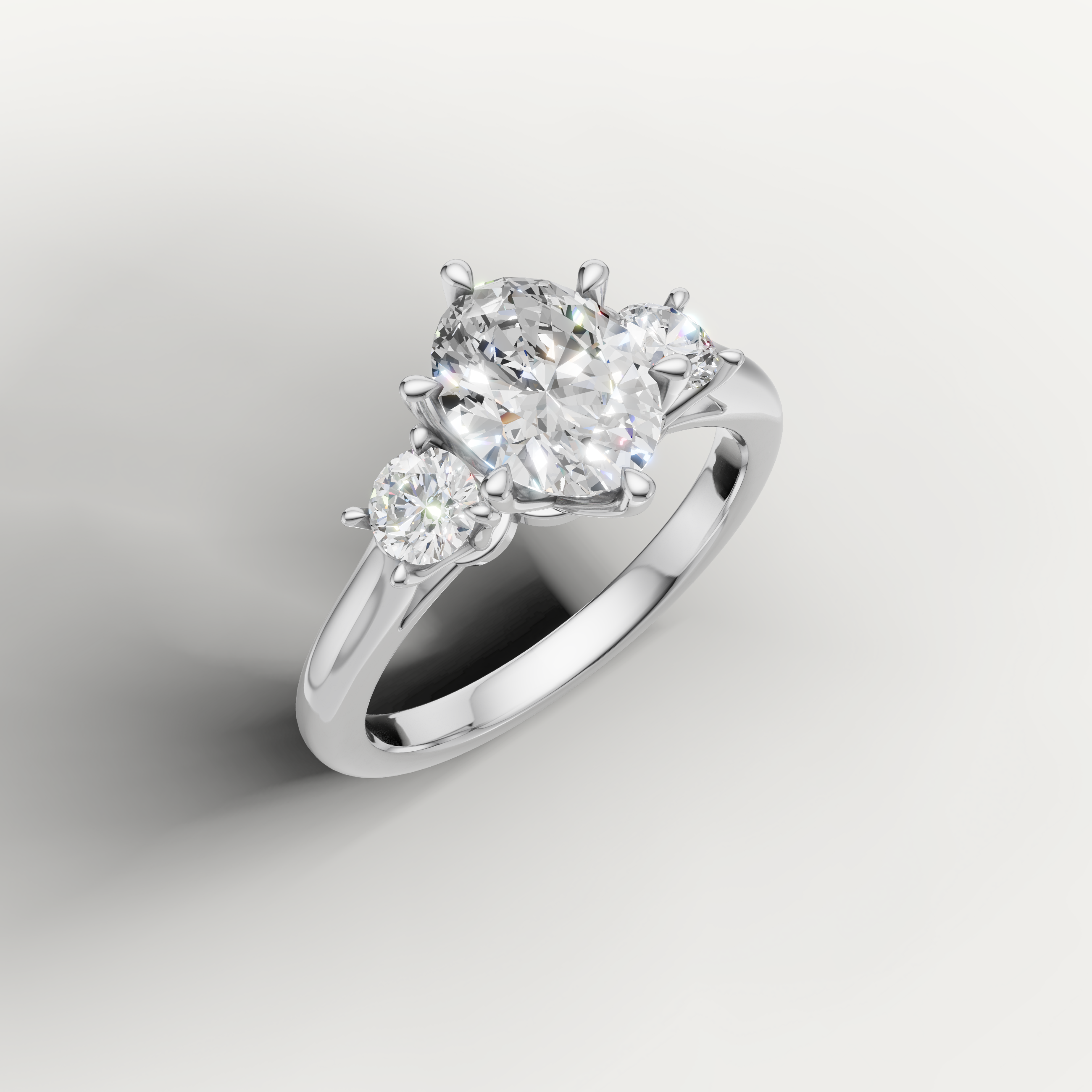 IGI certified oval lab diamond ring with round side stones white gold DEF VVS