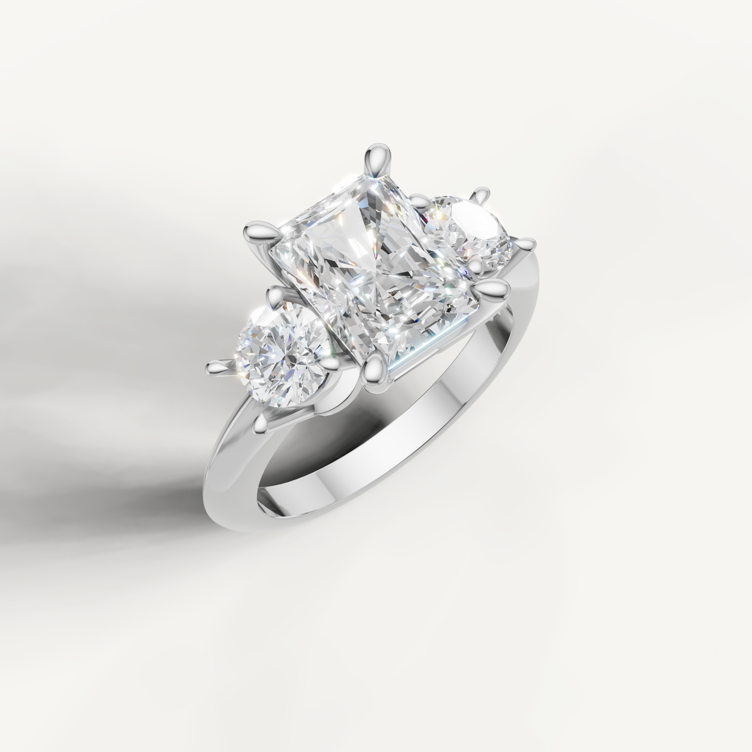 IGI certified radiant lab diamond ring with round side stones white gold DEF VVS