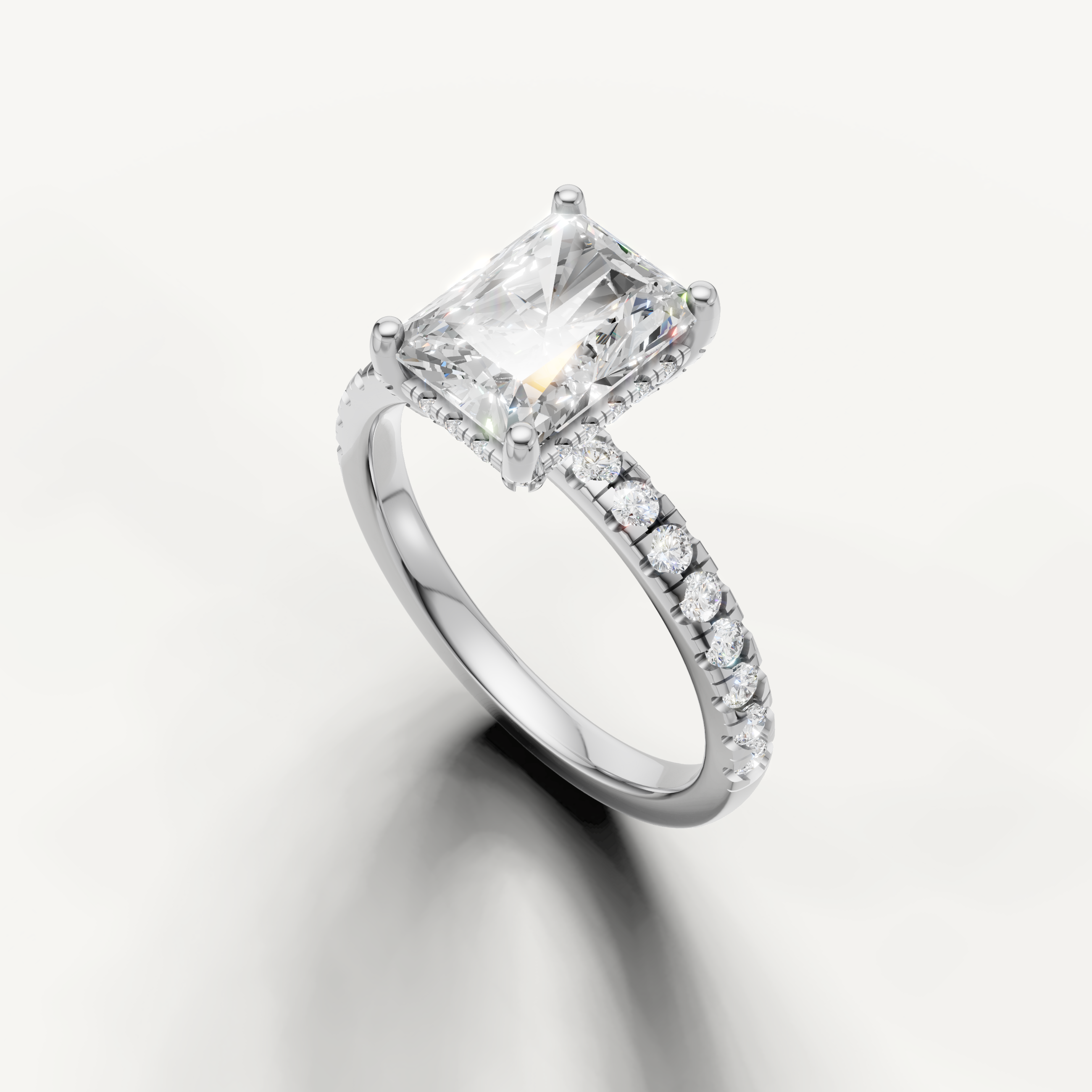 Radiant solitaire diamond ring with pavé band white gold elongated brilliance