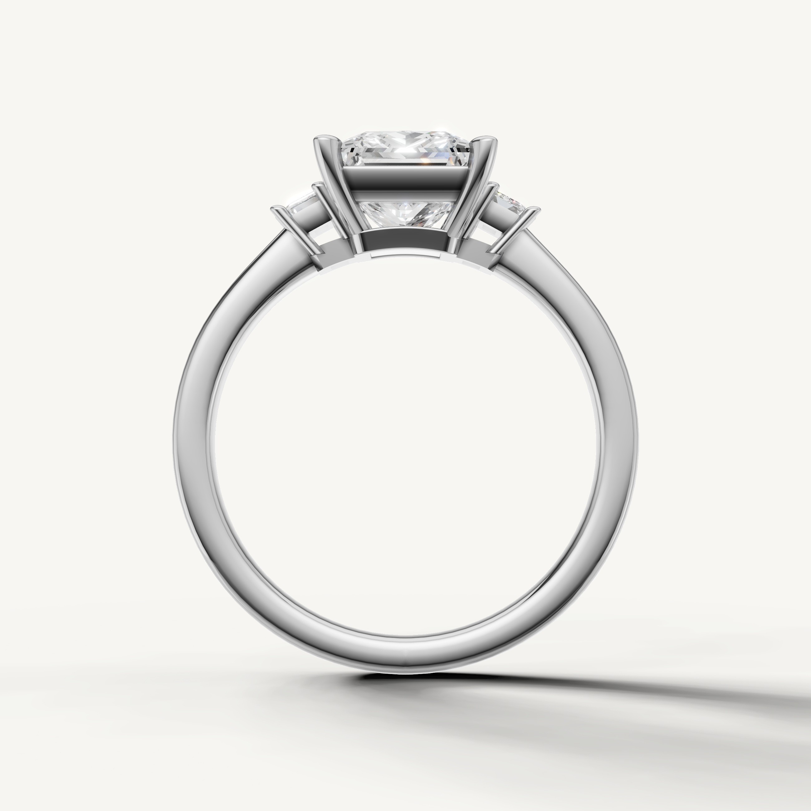 Classic princess lab grown diamond engagement ring in white gold with emerald side diamonds