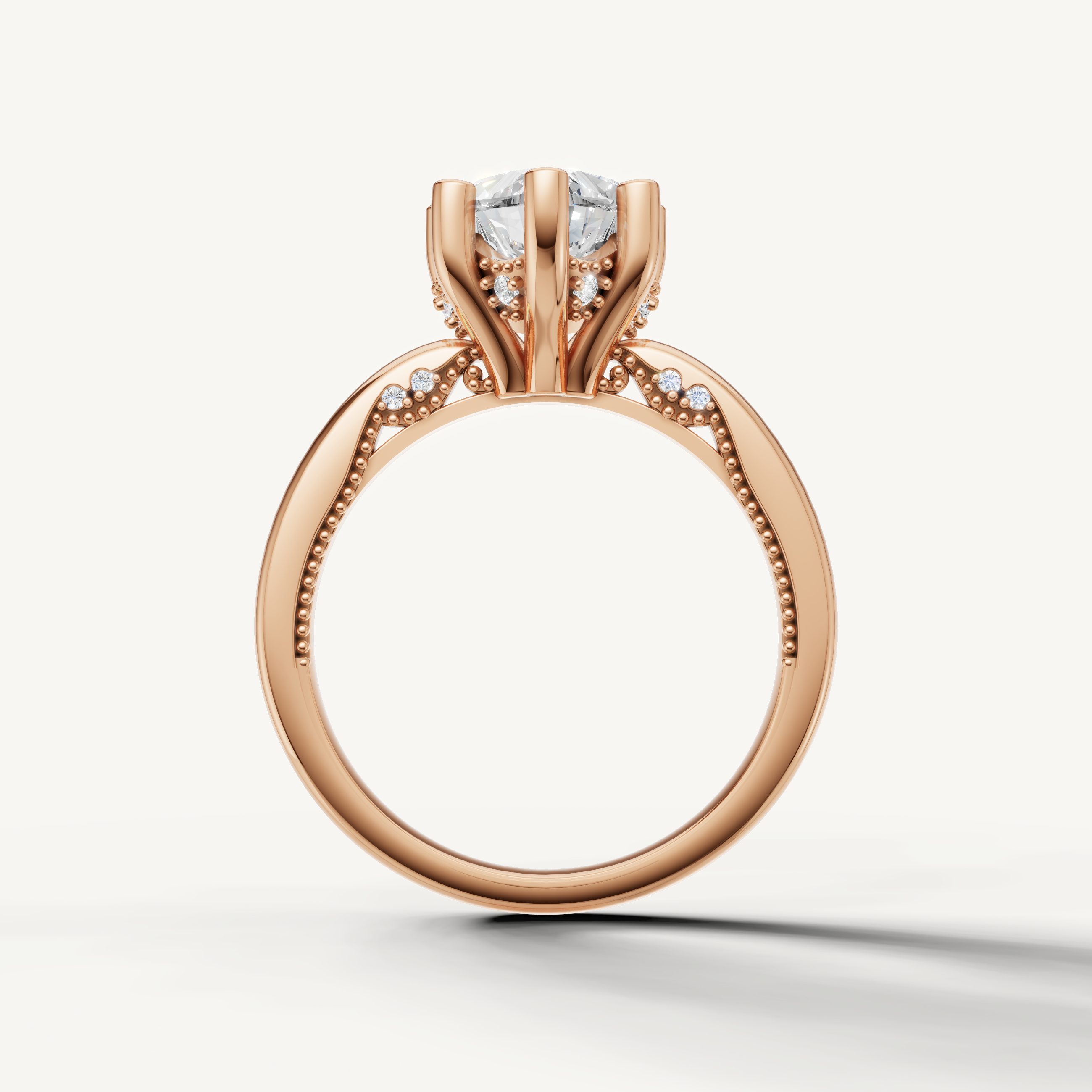 A sophisticated rose gold engagement ring that beautifully frames the sparkling, symbolic shape of a heart-cut center diamond.
