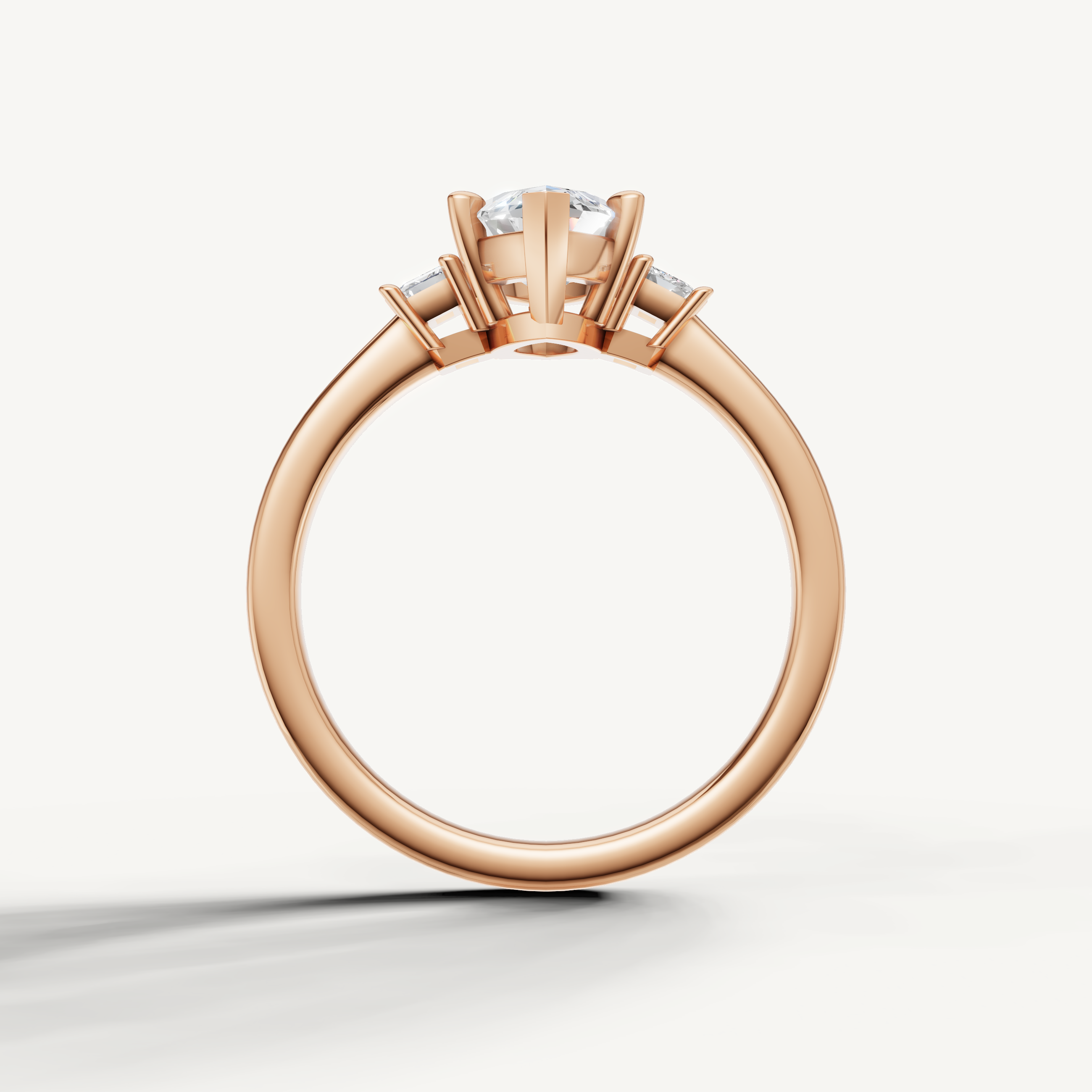 Minimalist marquise lab grown diamond engagement ring in 14K rose gold with side baguette diamonds