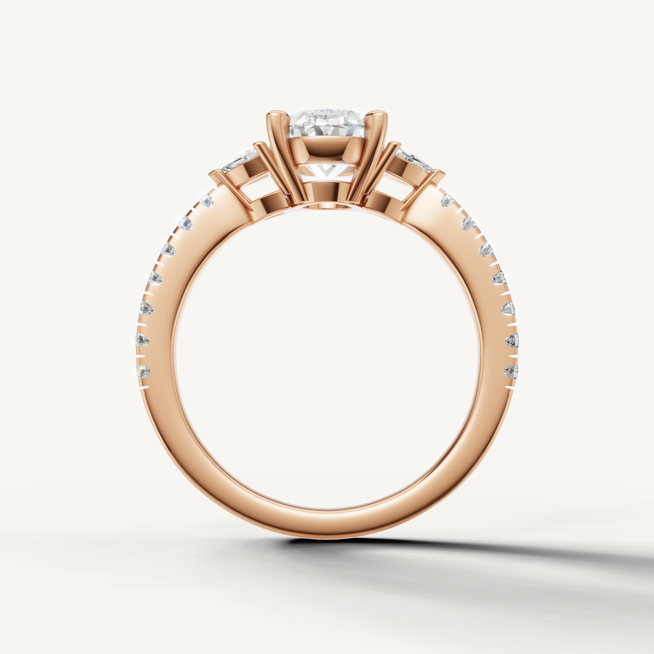 Three-stone oval cut lab grown diamond ring with pavé band in 14K gold