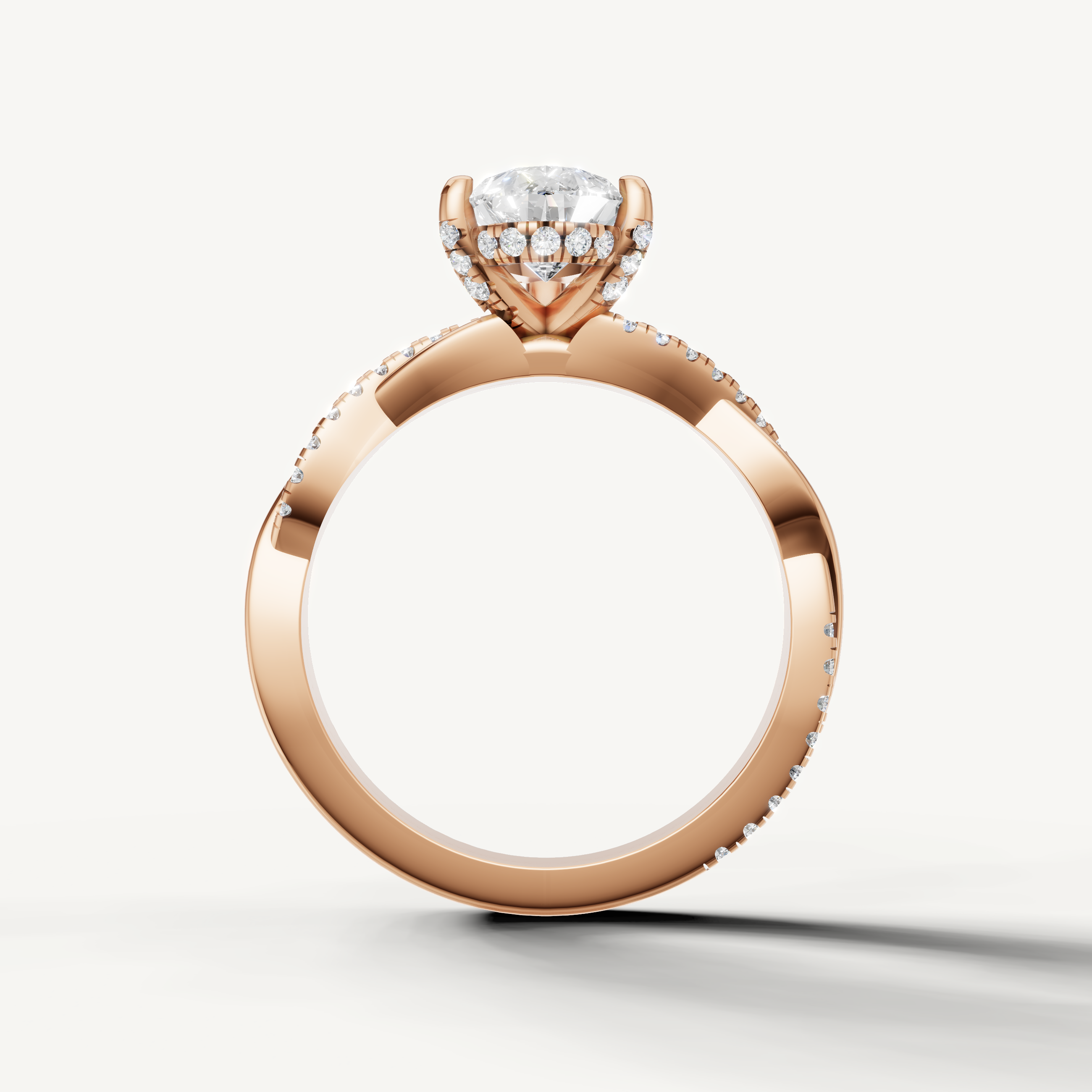modern pear lab grown diamond engagement ring in 14k rose gold with shimmering pavé diamond band