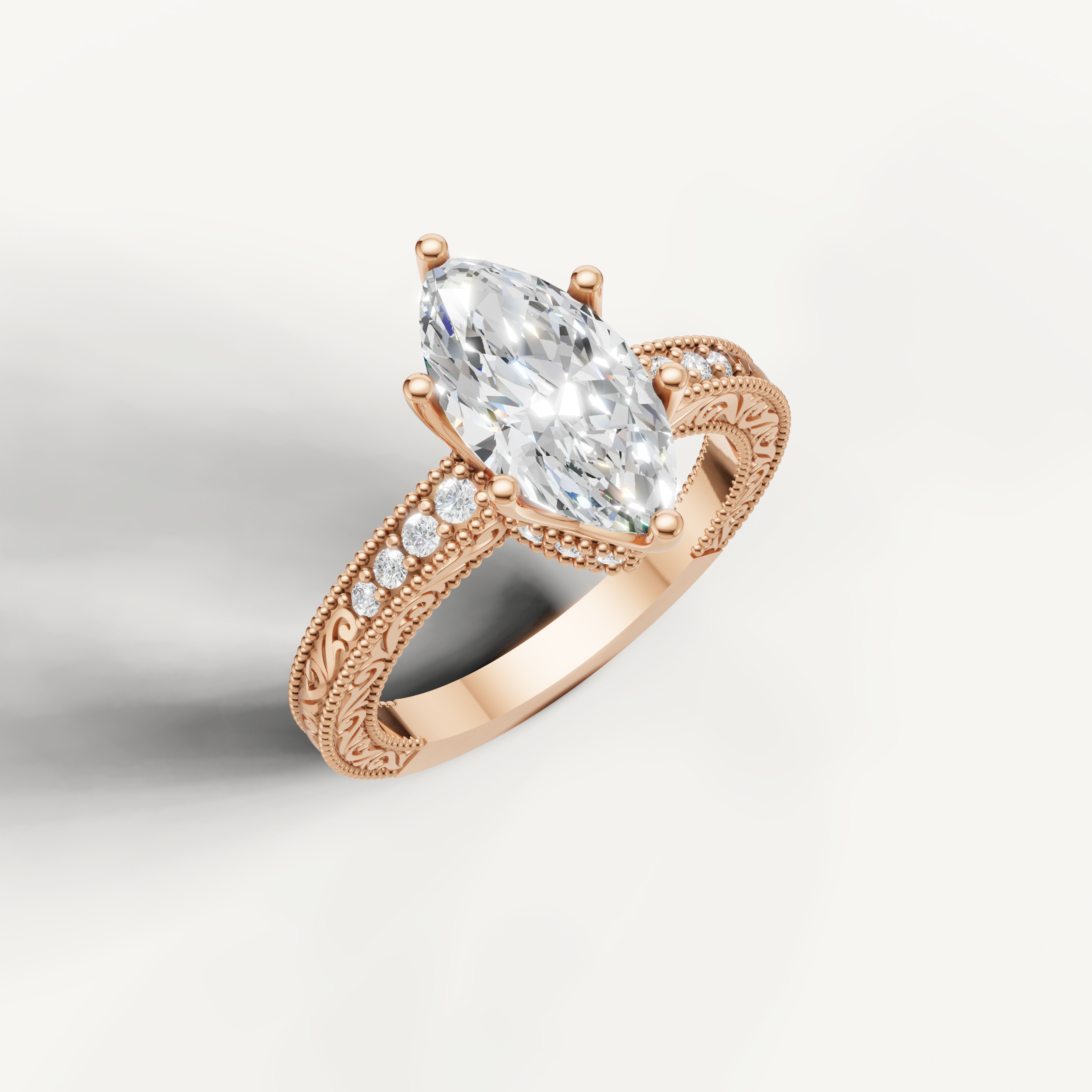 Rose gold marquise cut lab grown diamond ring featuring intricate vintage filigree craftsmanship by Raul Diamonds.