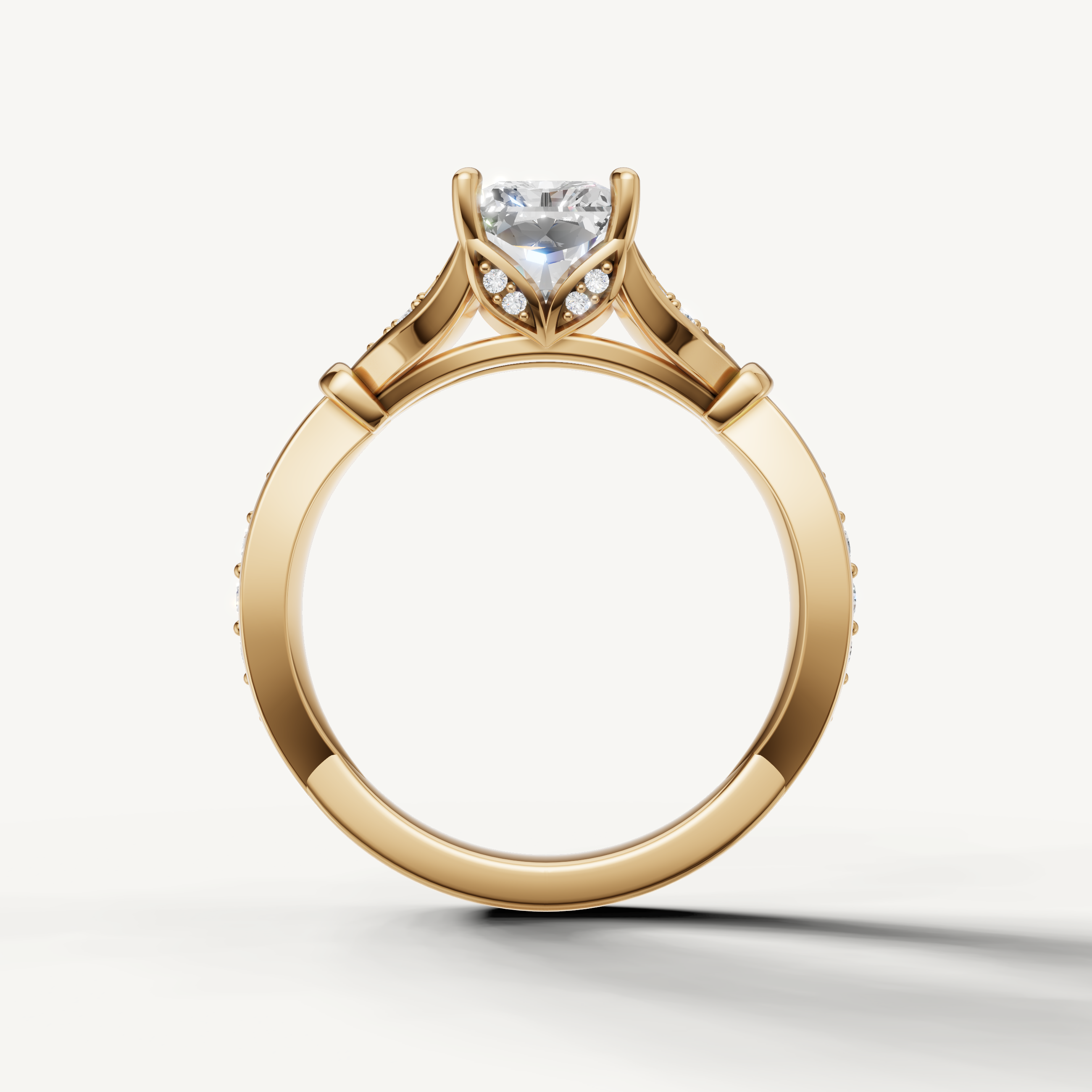 radiant cut lab grown diamond ring with leaf design pavé band yellow gold
