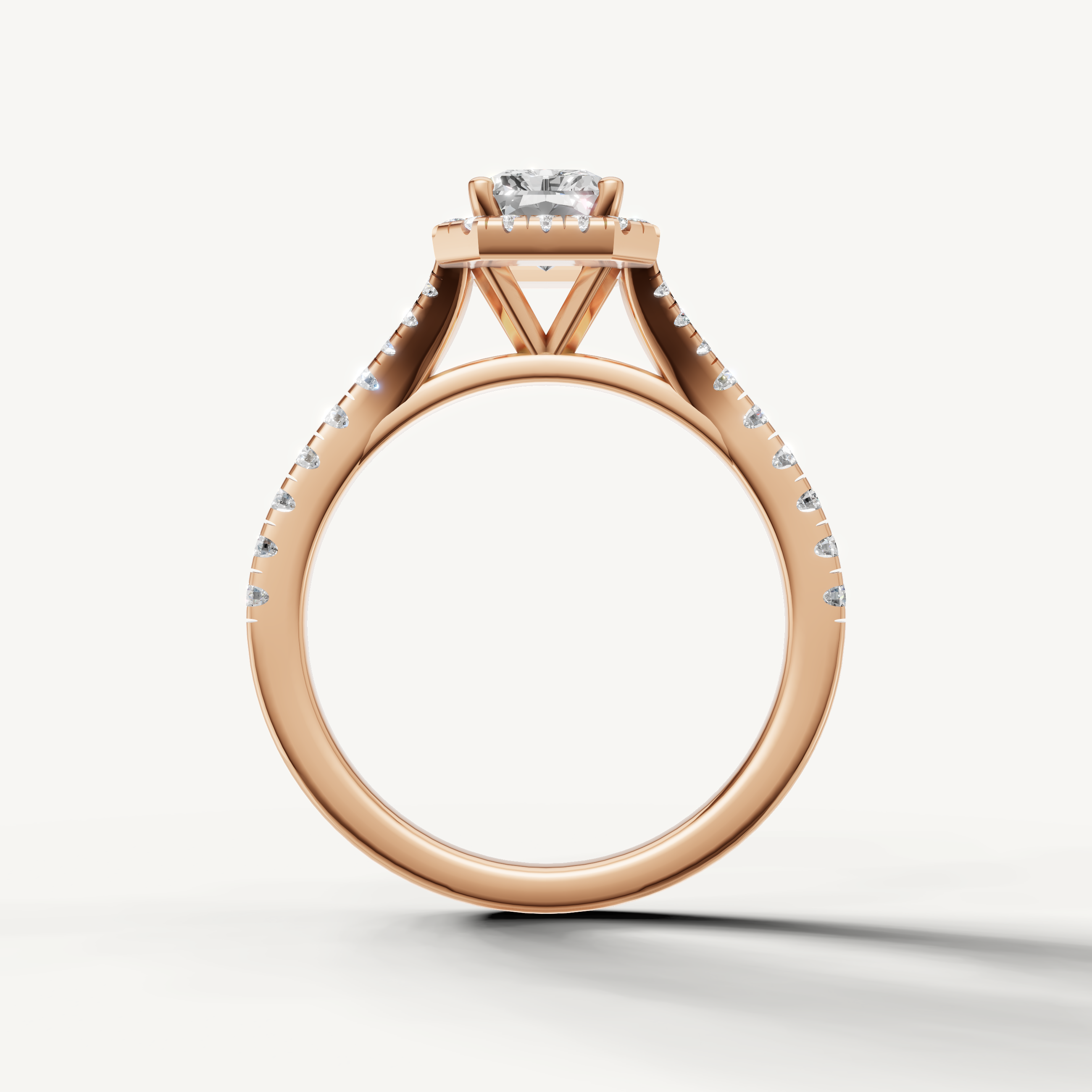 Radiant cut engagement ring with halo and pavé band rose gold