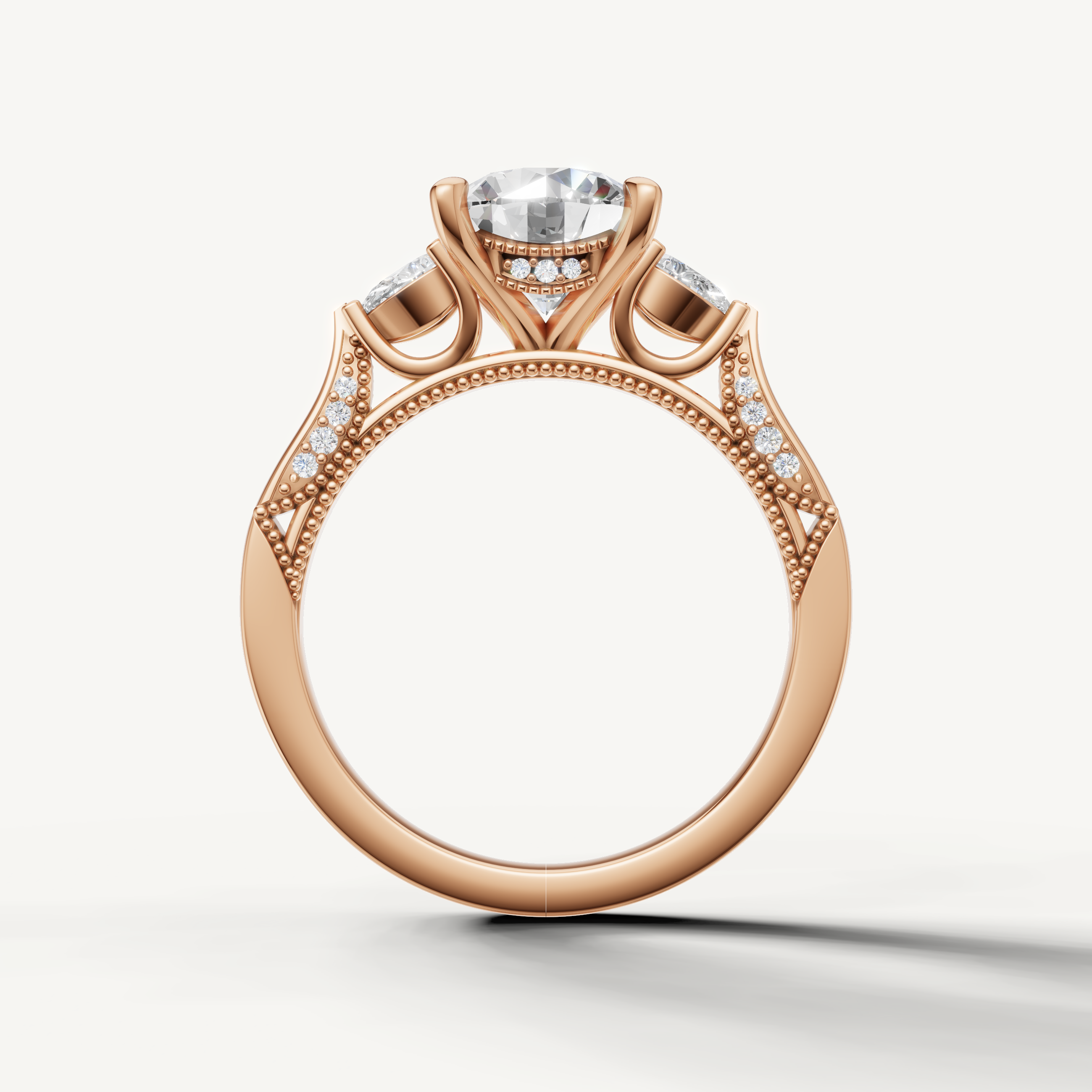 Round cut lab grown diamond engagement ring with pear side diamonds rose gold modern elegance
