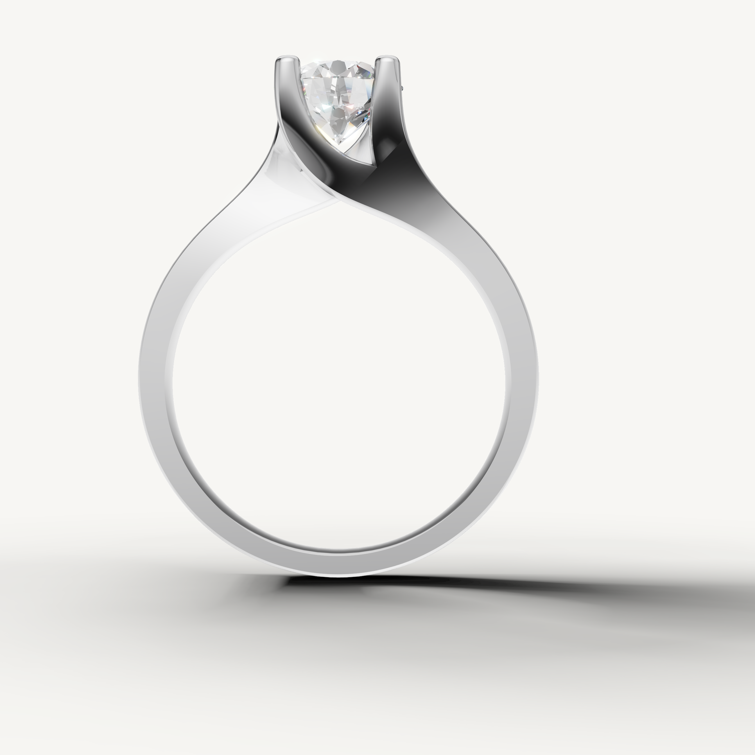 Round center diamond ring with elegant solitaire design from Raul Diamonds