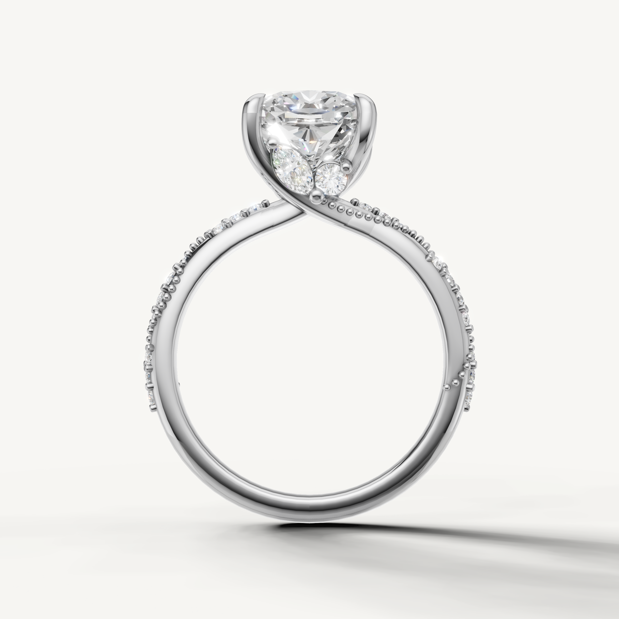 White gold cushion cut lab grown diamond ring with delicate twisted band and refined bridal craftsmanship
