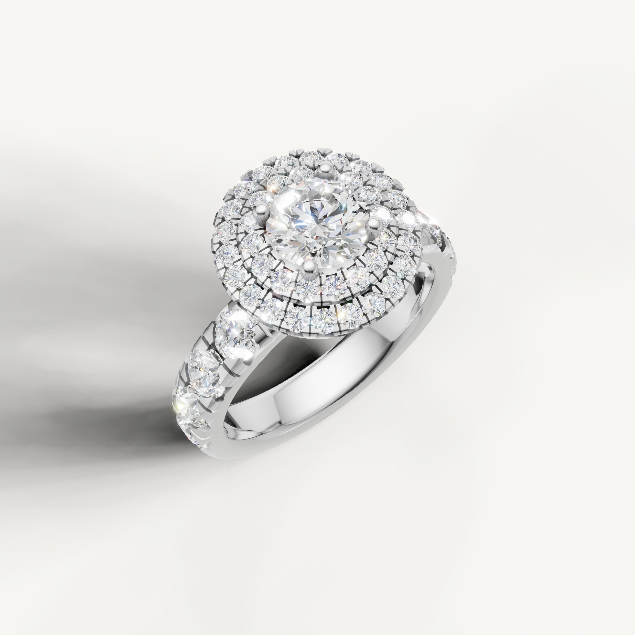 Premium round diamond ring with double halo and pavé band by Raul Diamonds