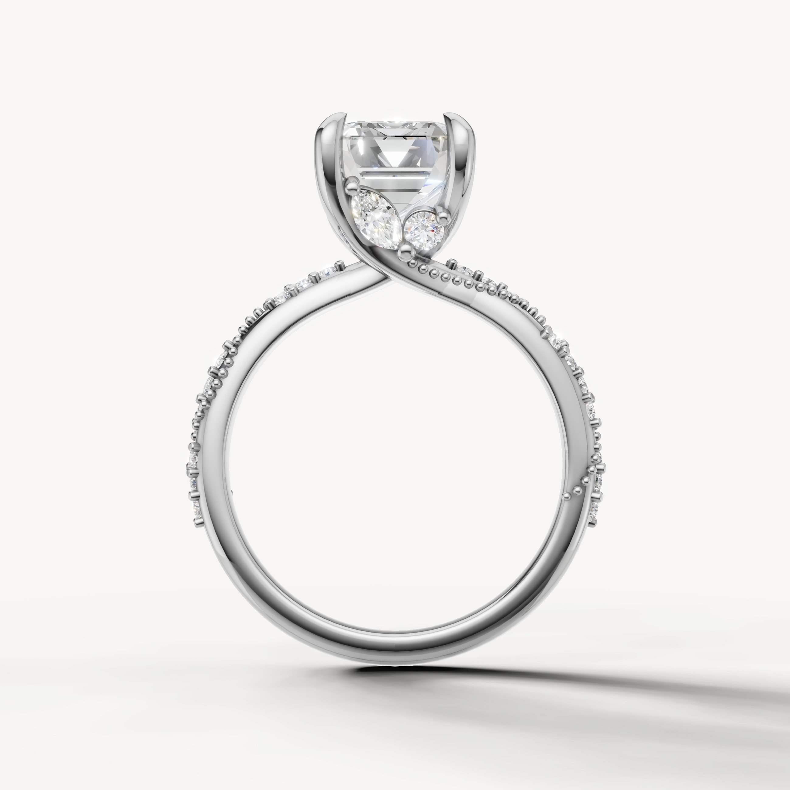 emerald cut lab grown diamond ring with elegant twisted shank pavé band white gold
