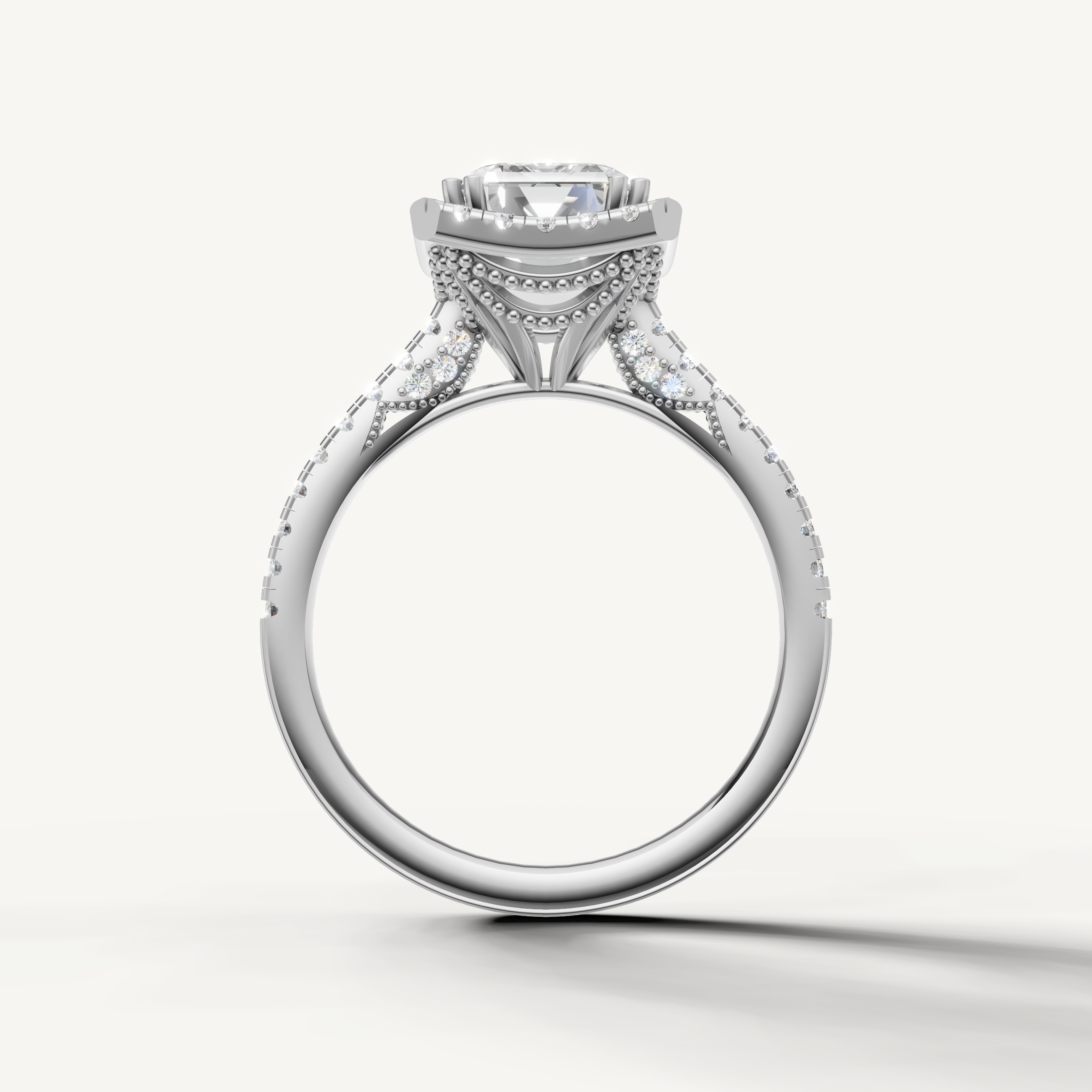 Premium emerald cut lab grown diamond halo ring in white gold with elegant pavé detailing by Raul Diamonds