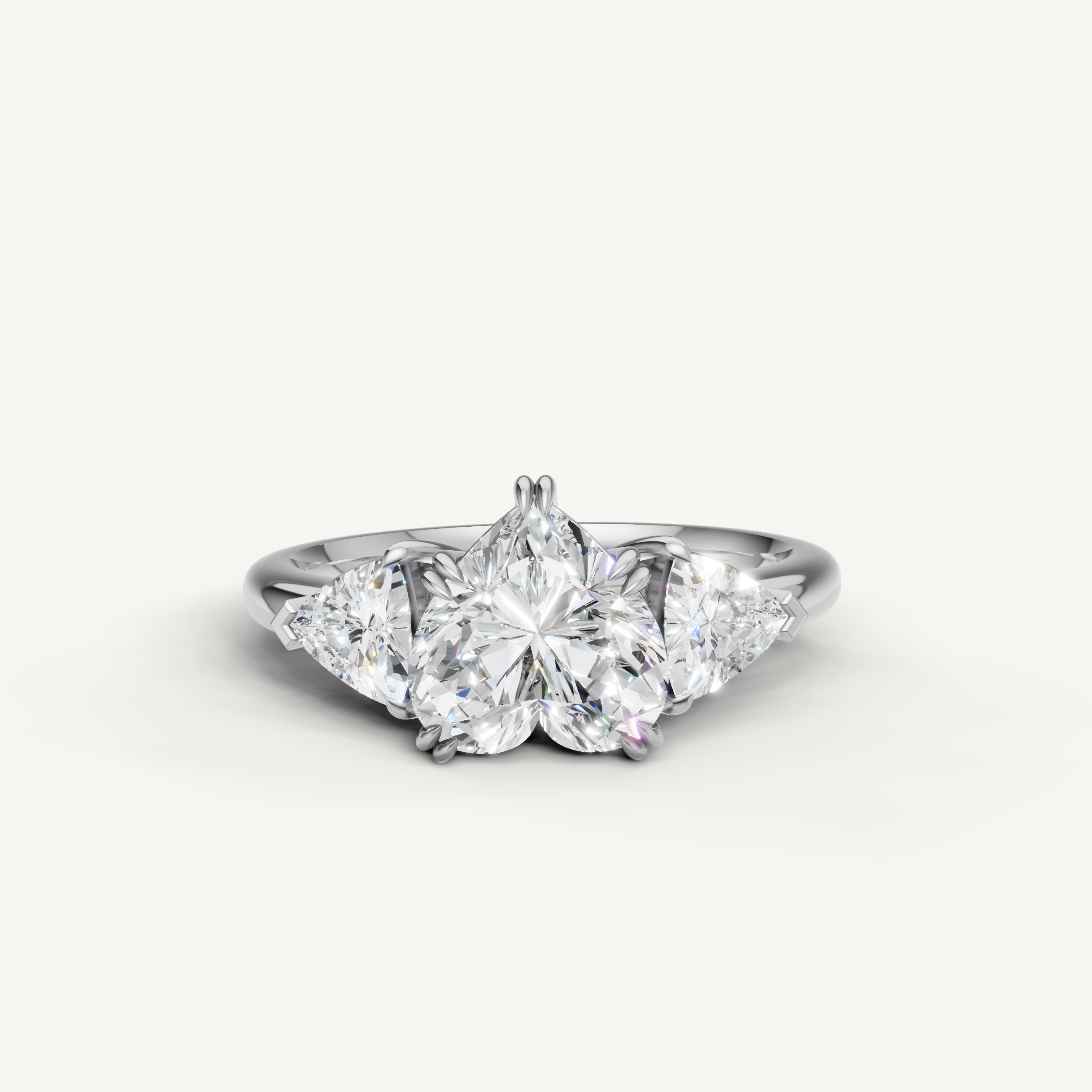 heart cut lab grown diamond engagement ring with trillion side stones in 14k white gold