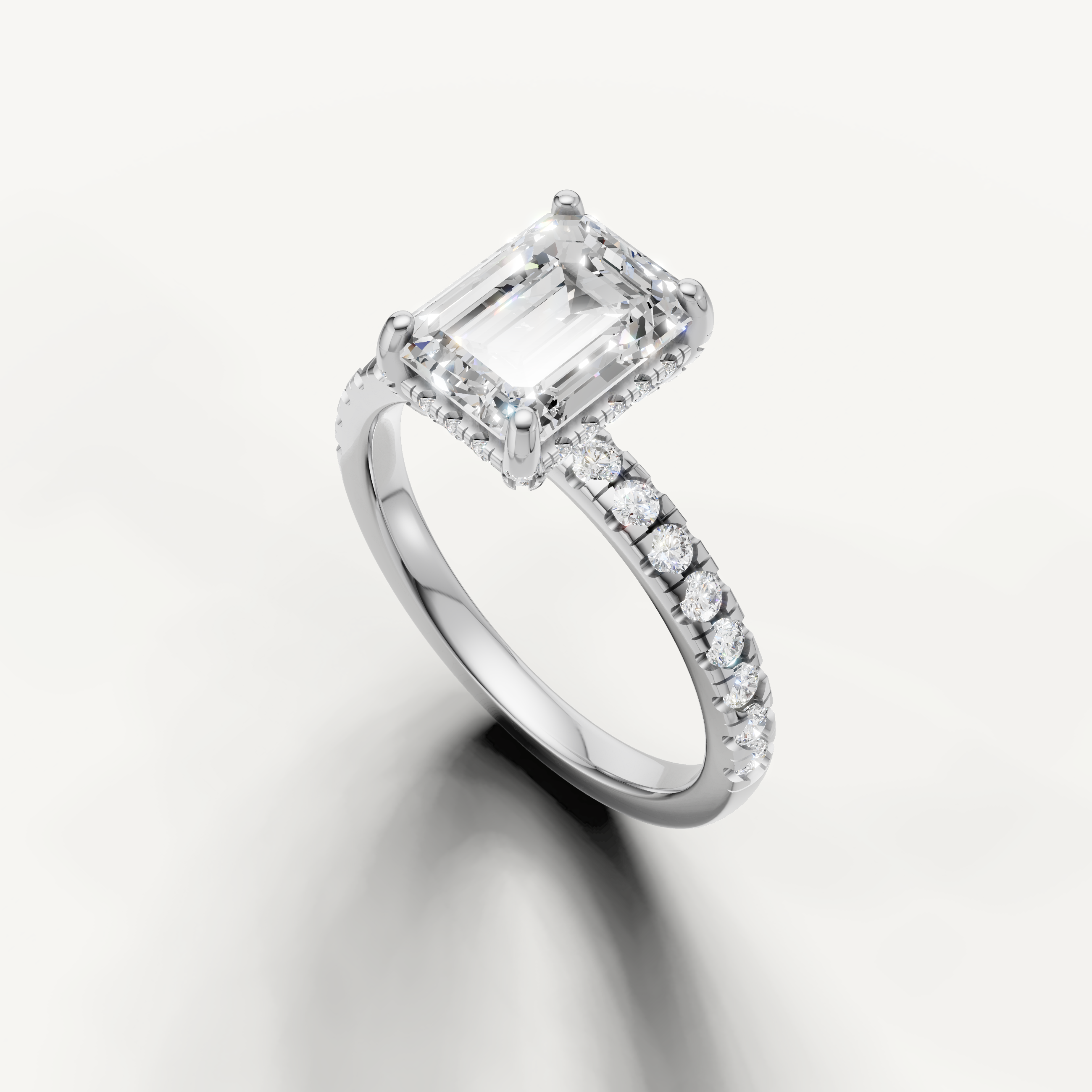 Emerald cut solitaire diamond ring with pavé band white gold elegant design