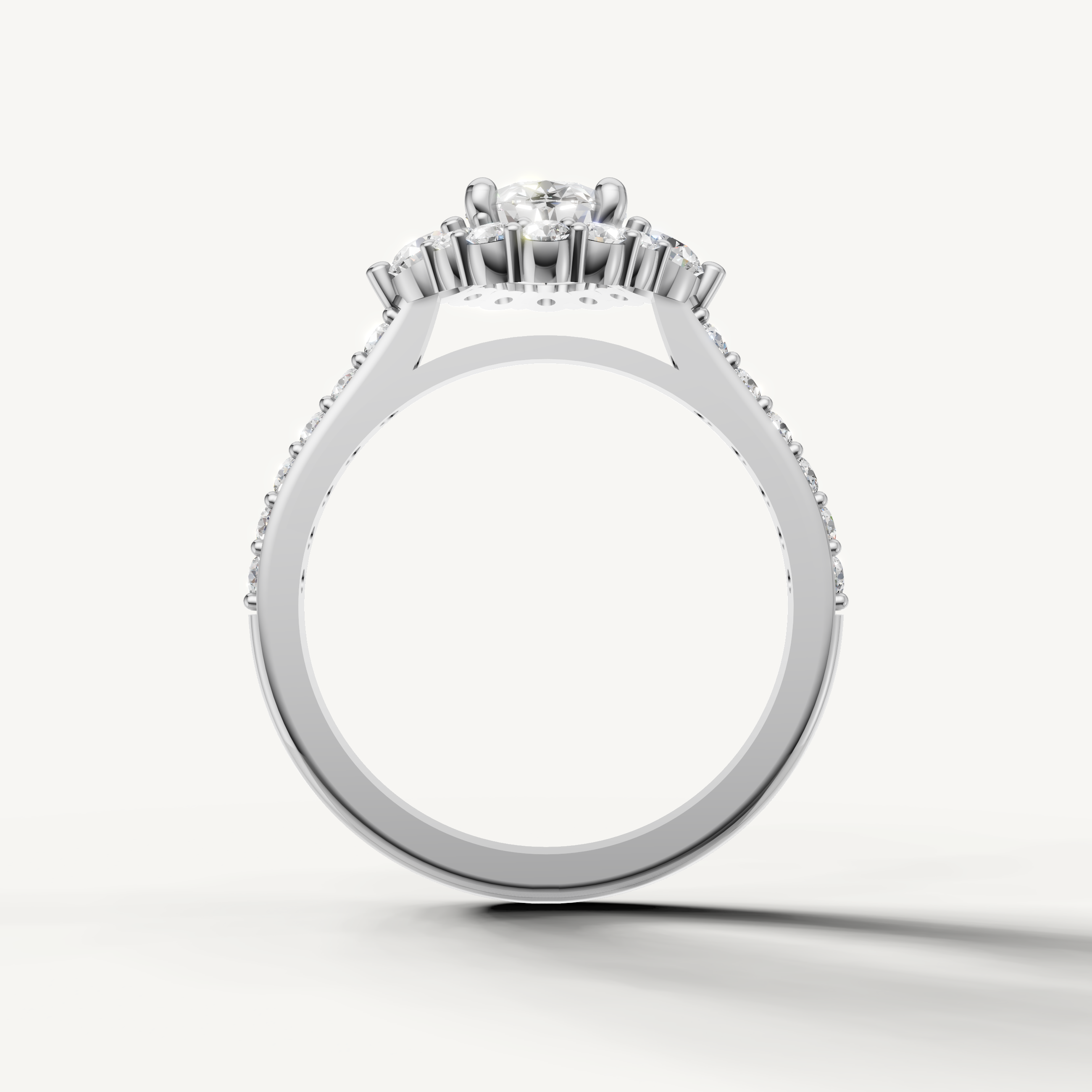 Oval center diamond ring with shimmering halo diamonds from Raul Diamonds