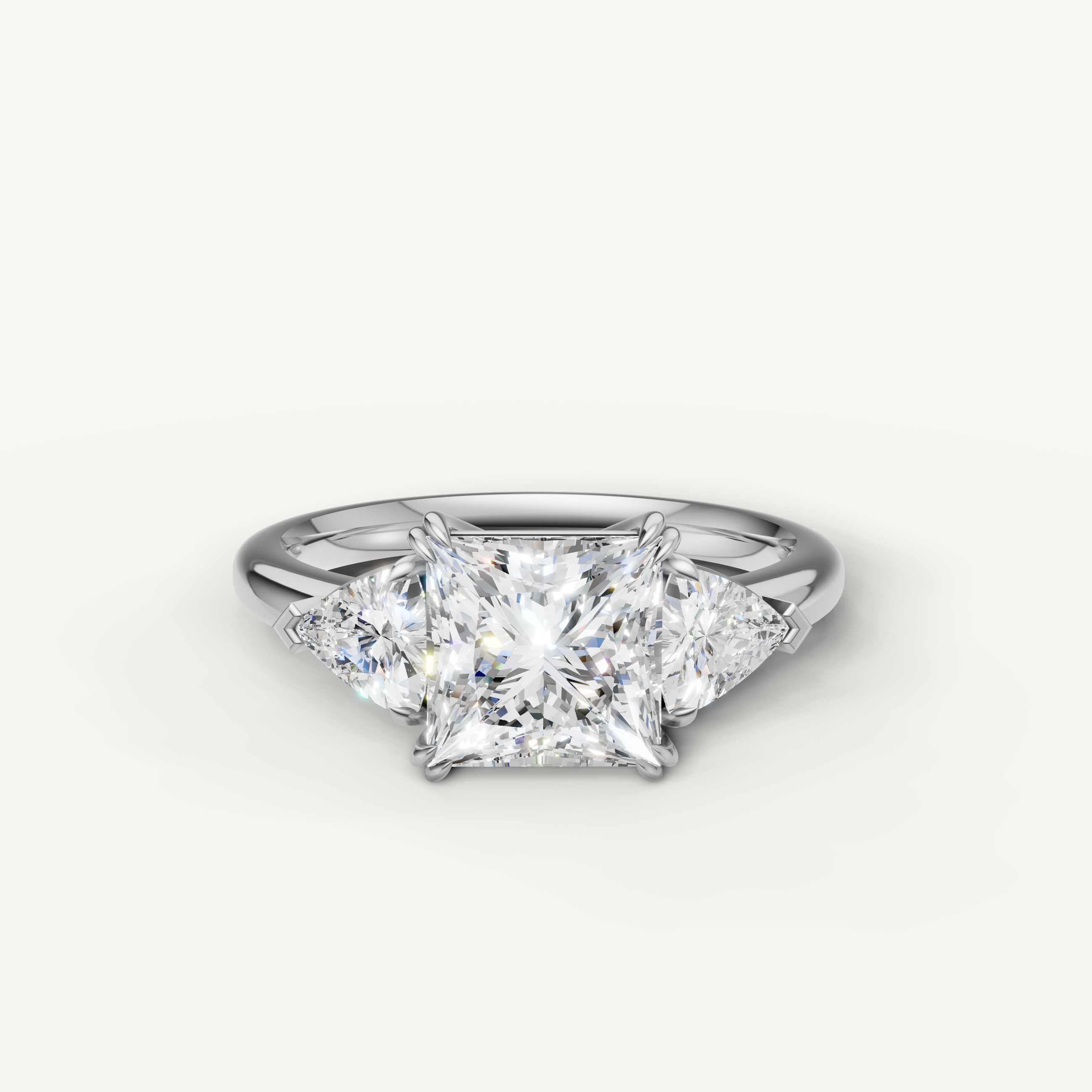princess cut lab grown diamond engagement ring with trillion side stones in 14k white gold