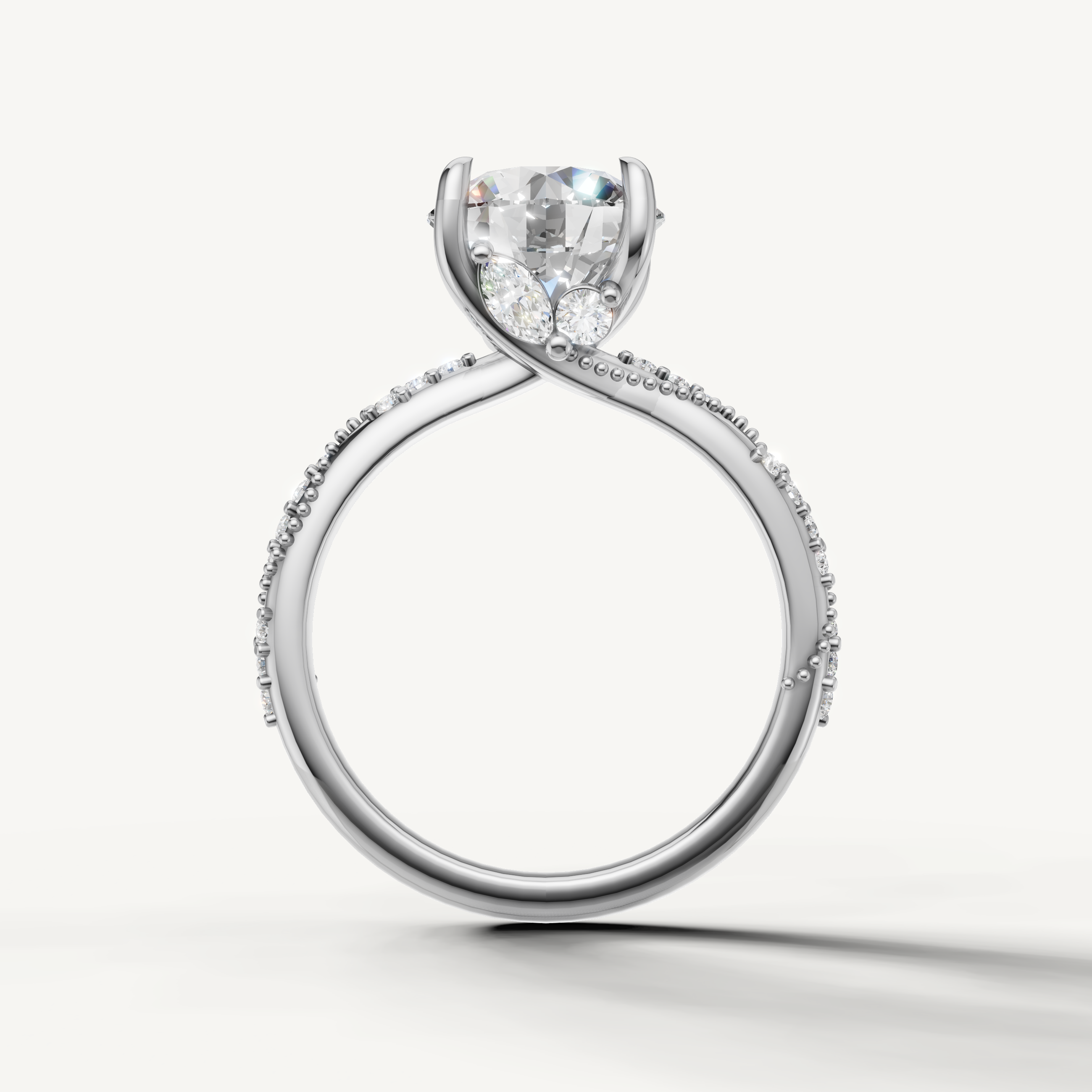round diamond engagement ring with elegant crossover pavé band white gold