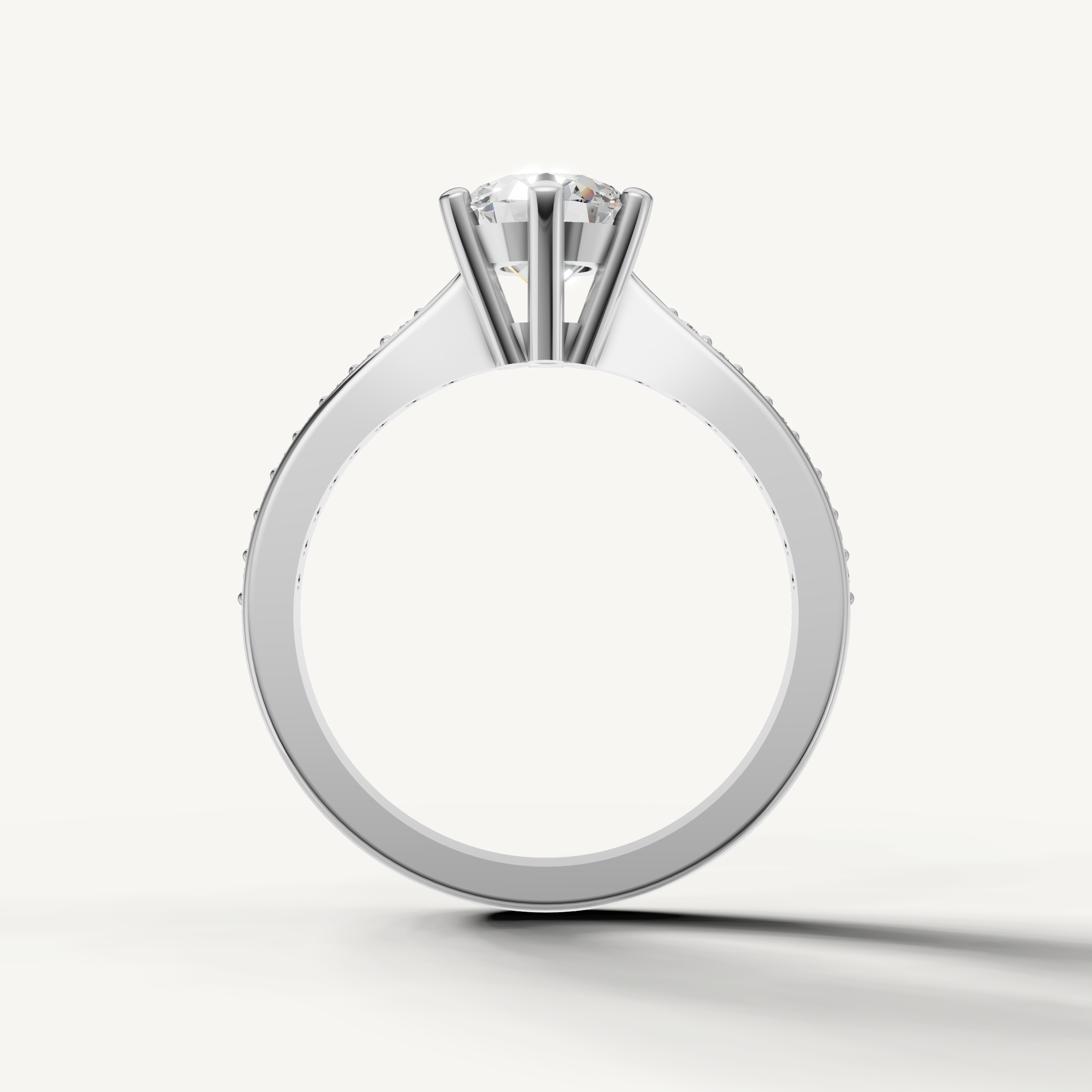 Round center diamond ring with shimmering pavé diamonds from Raul Diamonds