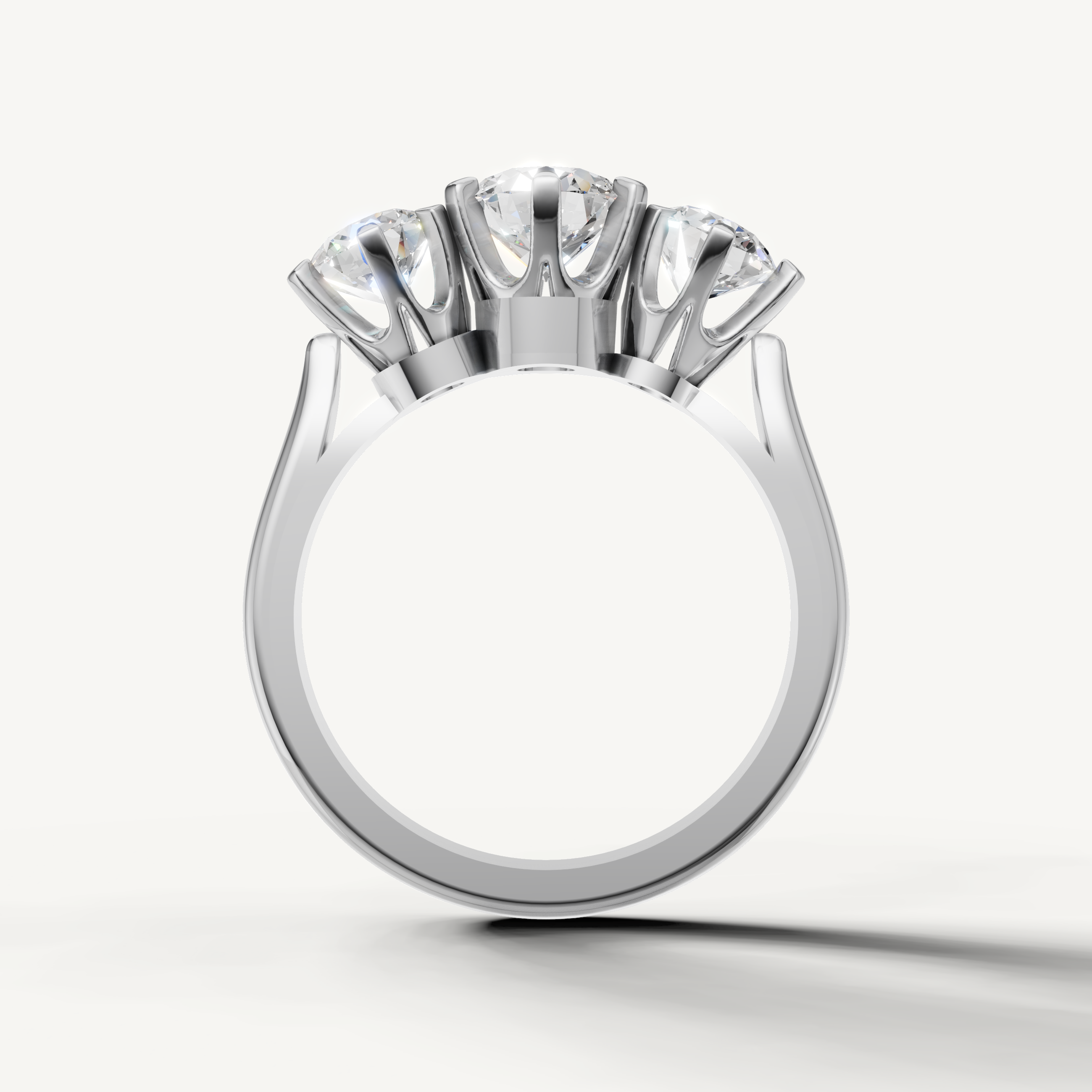 Round center diamond ring with brilliant side stones from Raul Diamonds