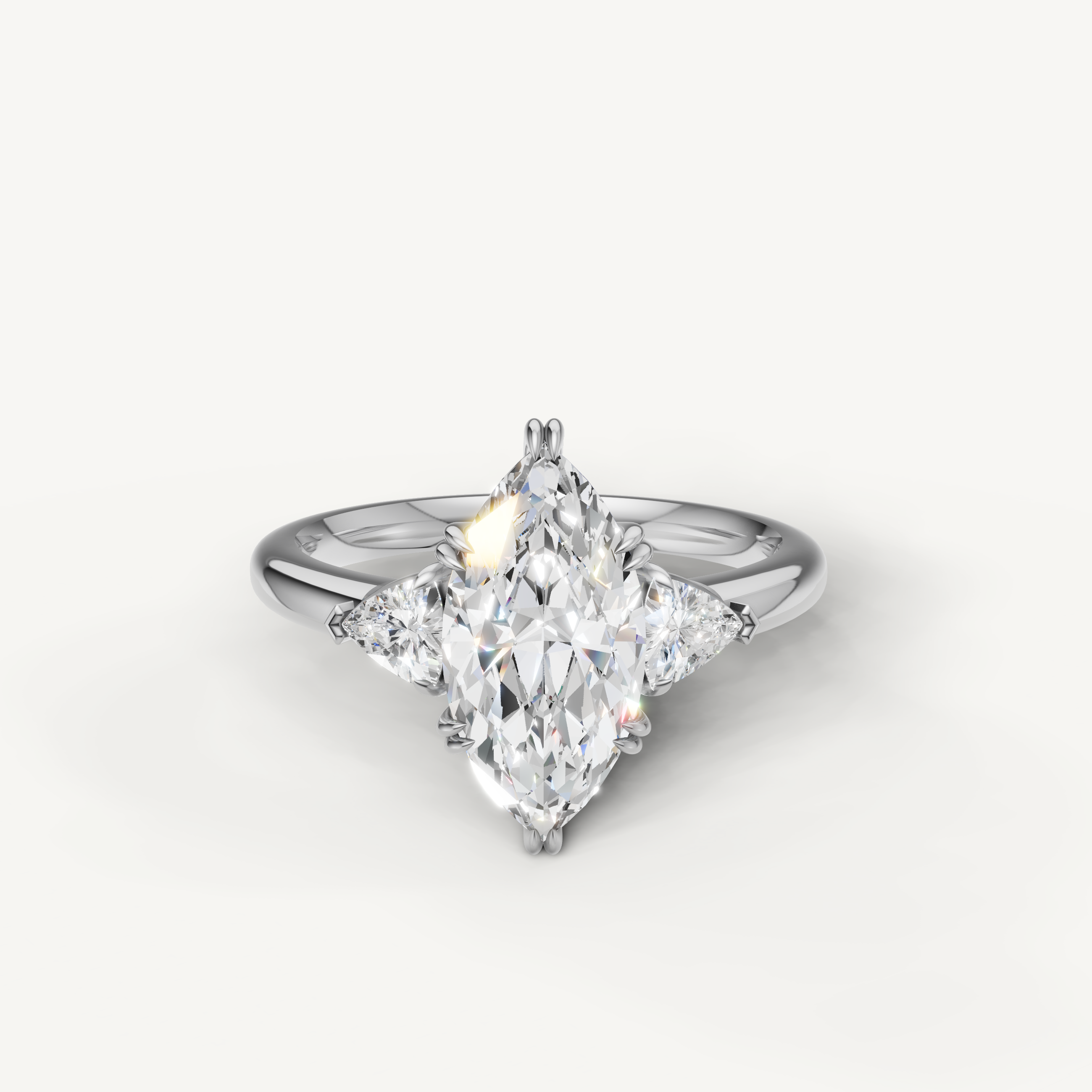 marquise cut lab grown diamond engagement ring with trillion side stones in 14k white gold