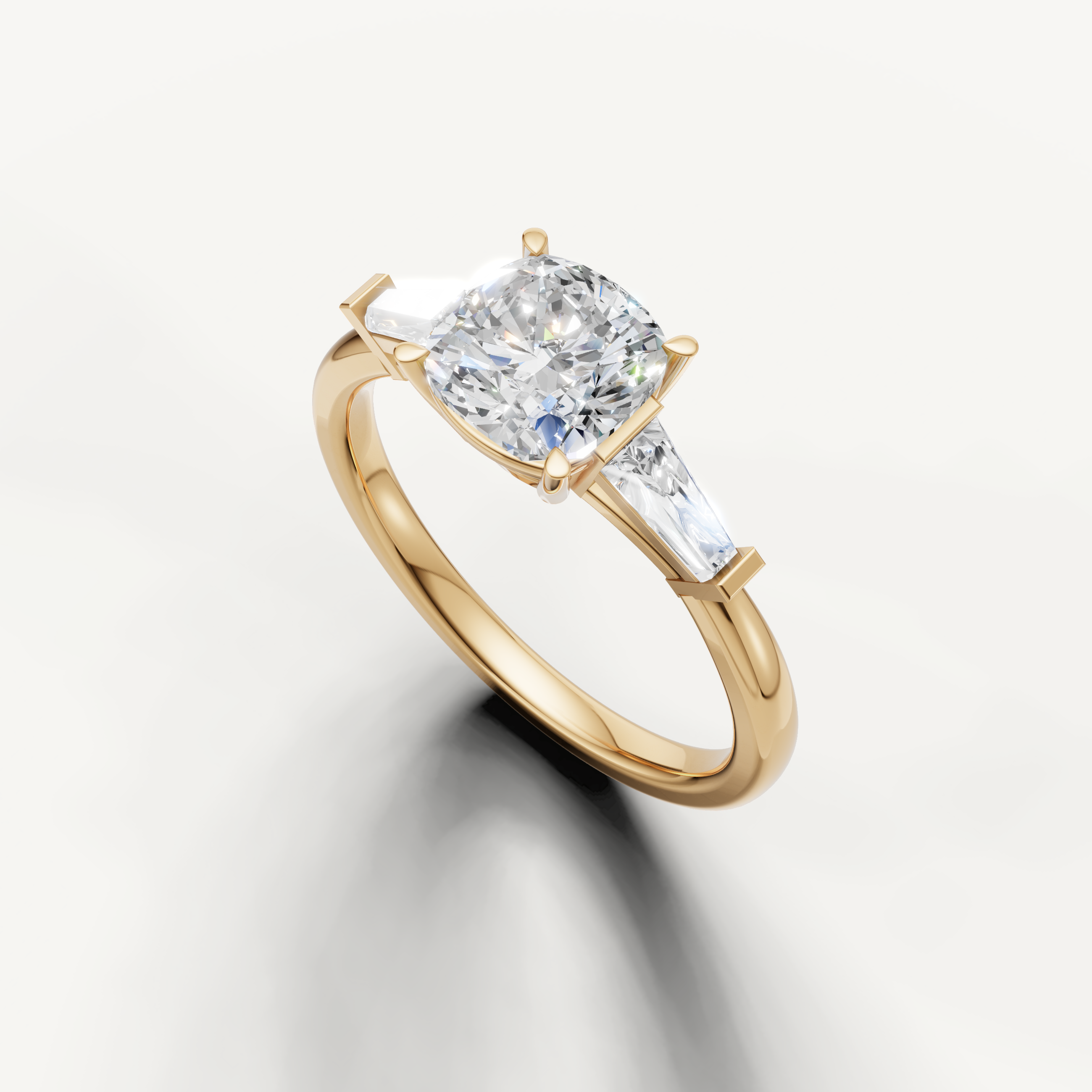 Cushion cut solitaire diamond ring with tapered baguette side stones yellow gold elegant design