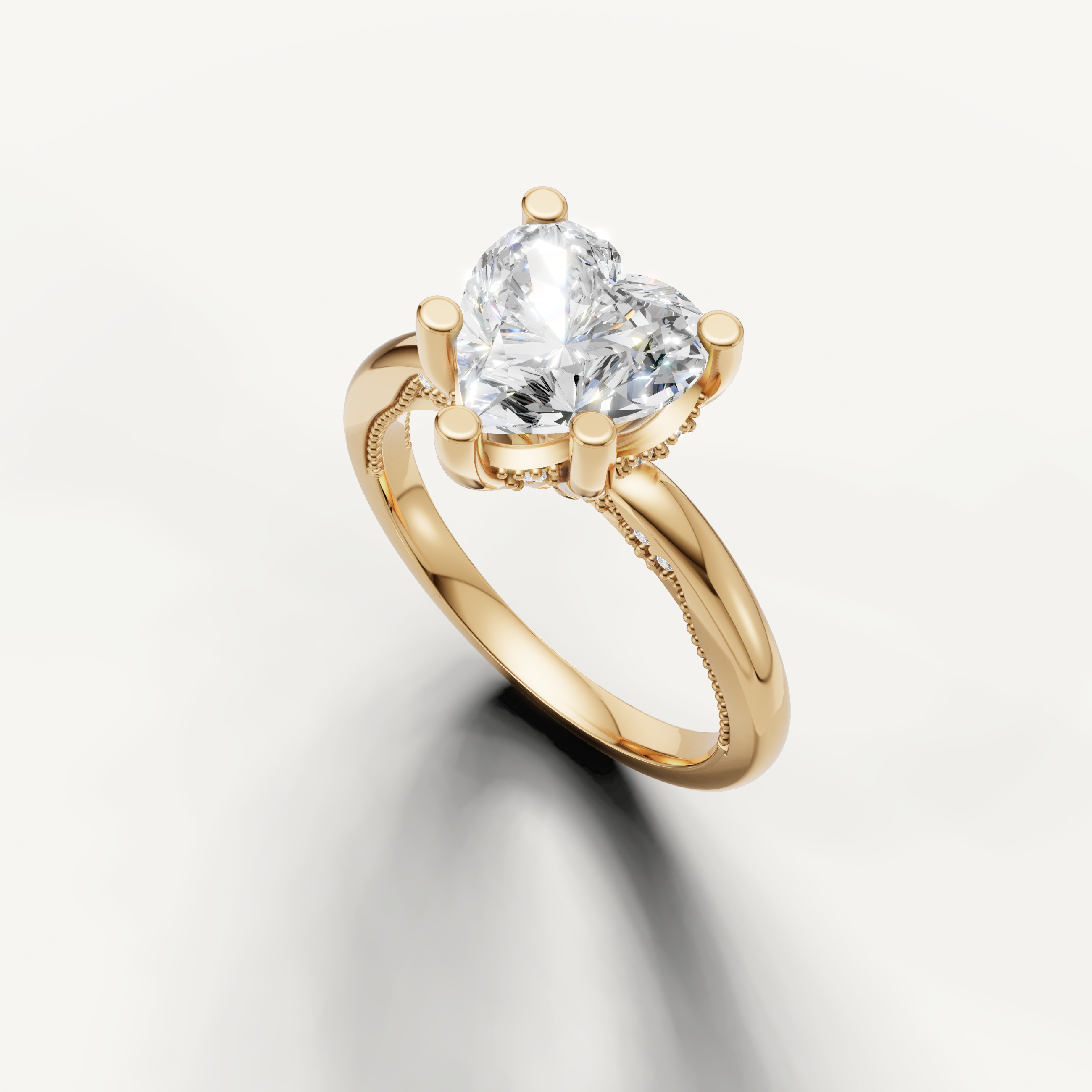 A luxurious heart-cut engagement ring with a smooth, high-polish yellow gold band, highlighting the unique silhouette of the center stone.
