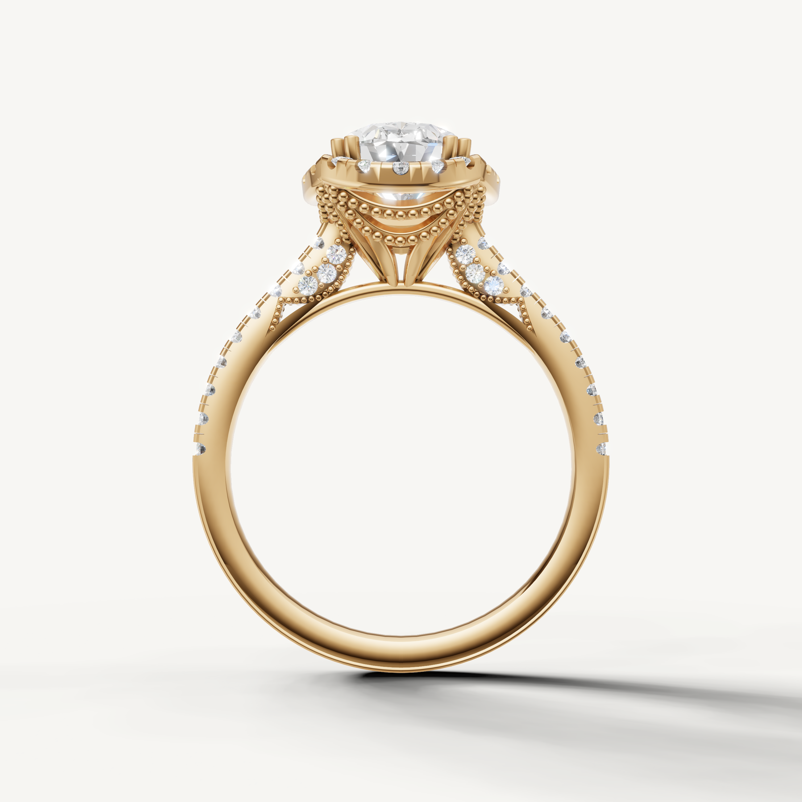 Luxury oval cut lab grown diamond halo ring in yellow gold with modern pavé detailing by Raul Diamonds