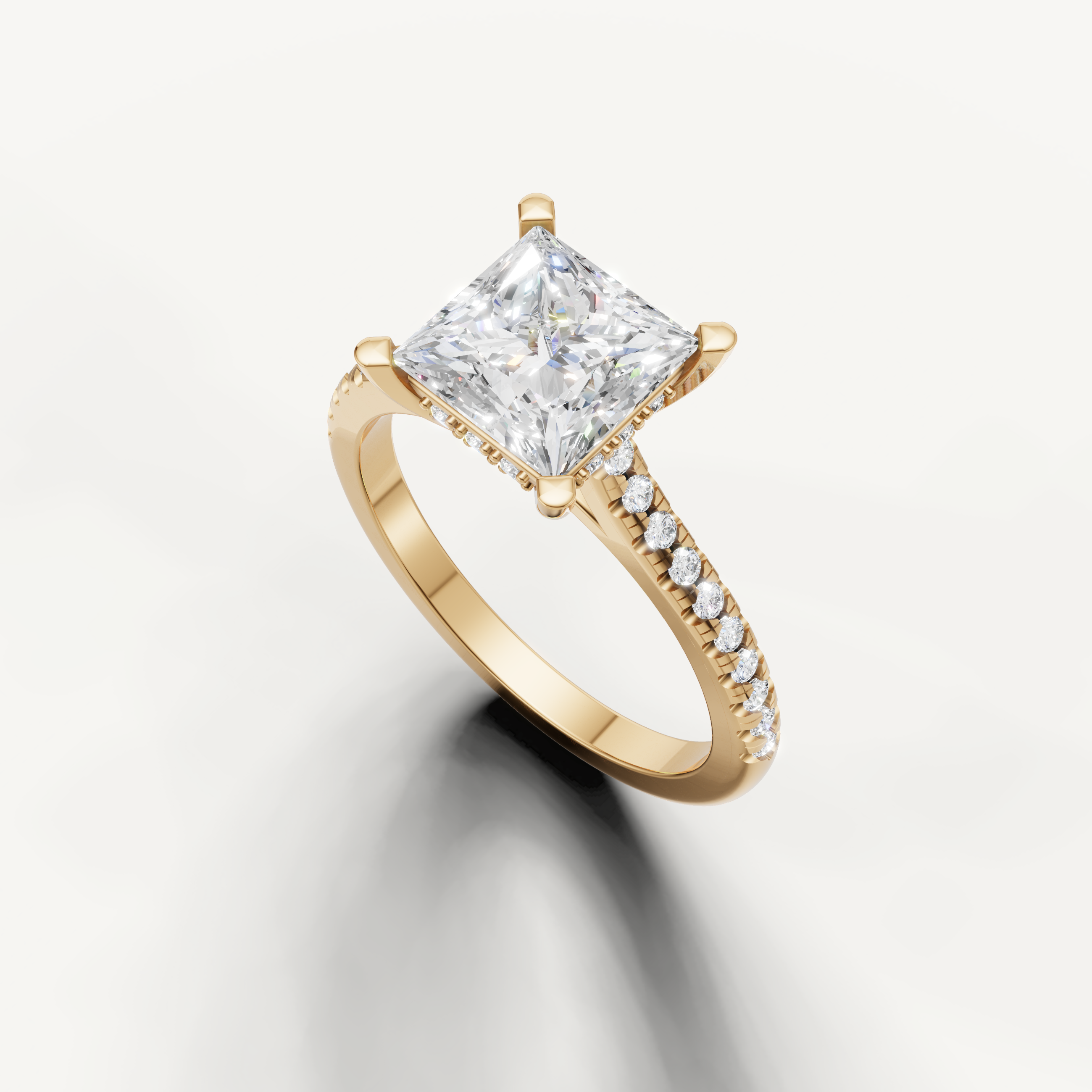 14K yellow gold princess diamond engagement ring featuring a sparkling pavé setting by Raul Diamonds