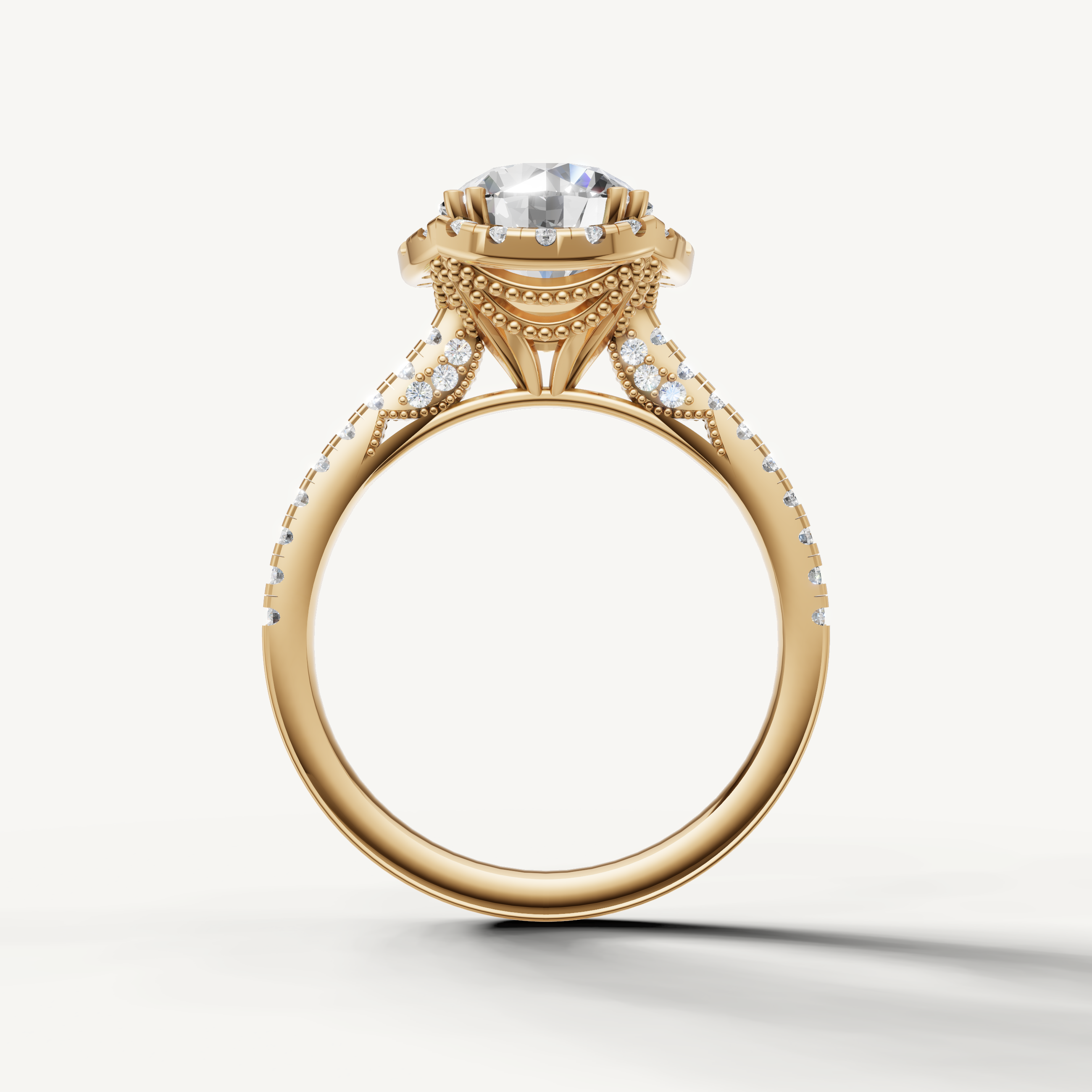 Luxury round cut lab grown diamond halo ring in yellow gold with modern pavé detailing by Raul Diamonds
